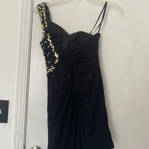 A perfect party gown. One shoulder. Black. Never worn